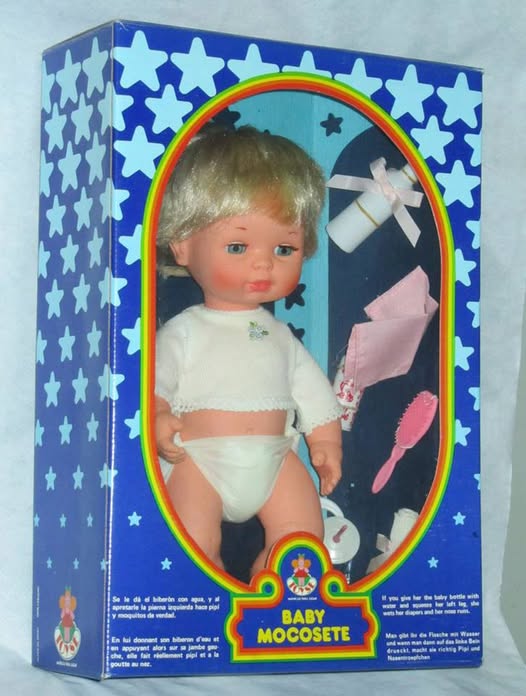 Muñeco Baby Mocosete en su caja.