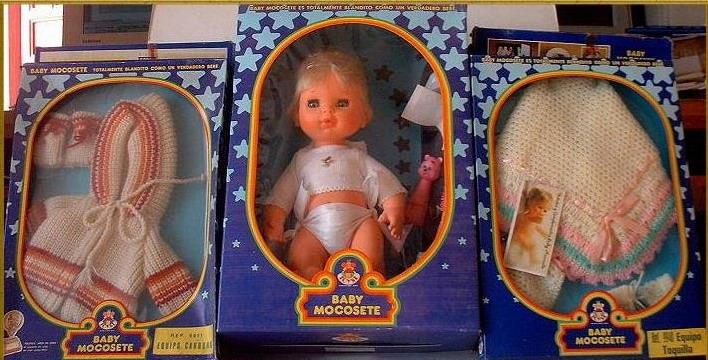 Muñecos Baby Mocosete en sus cajas