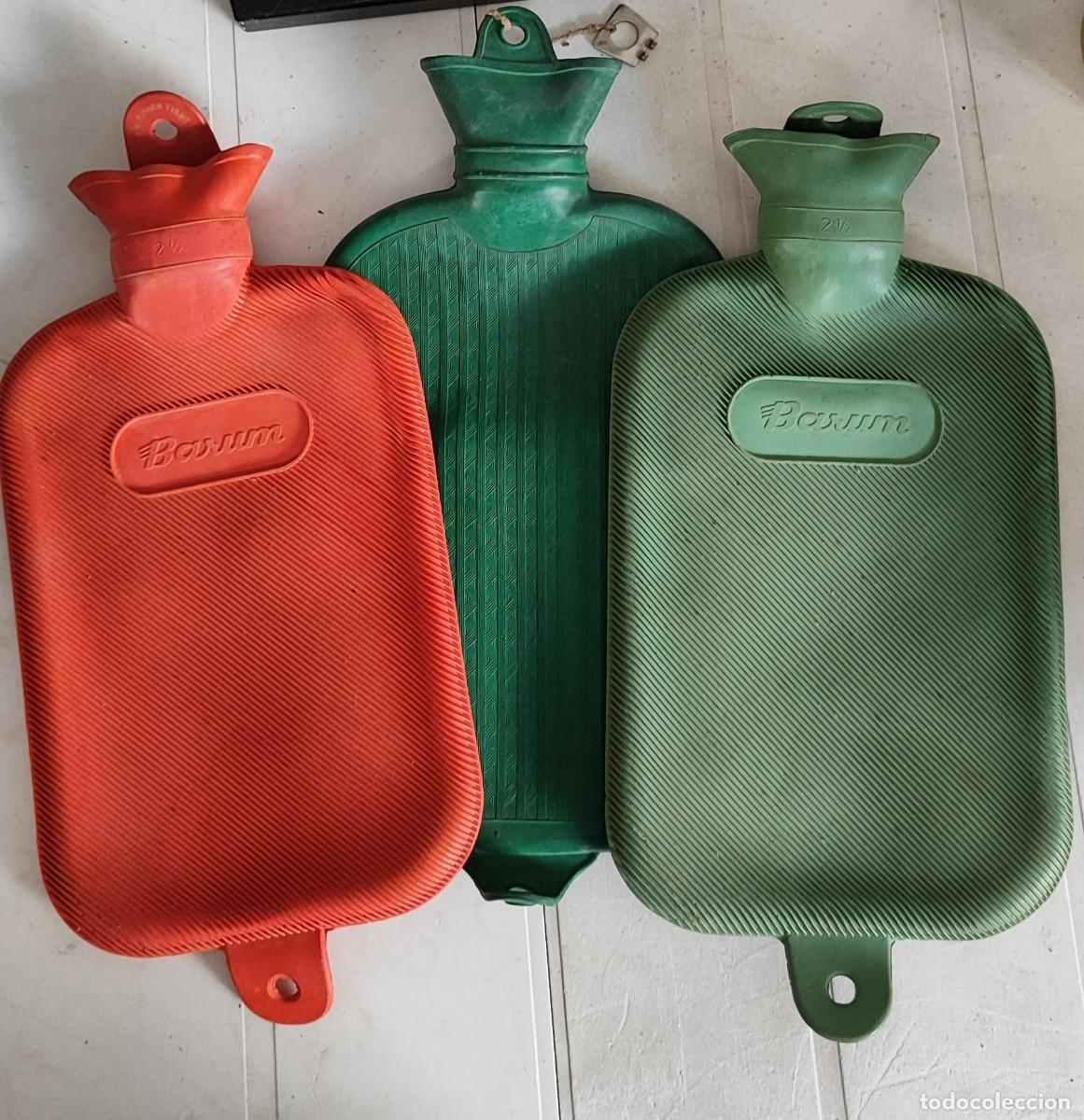 Tres bolsas de agua caliente de goma.
