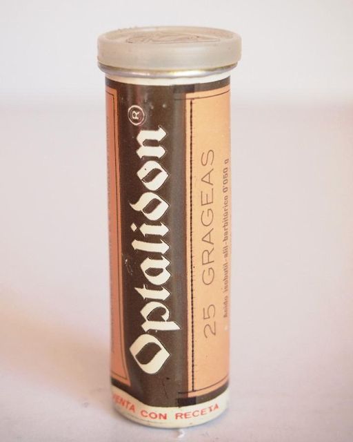 Tubo antiguo de Optalidón de 25 grageas, marrón y rosa, con tapón metálico.