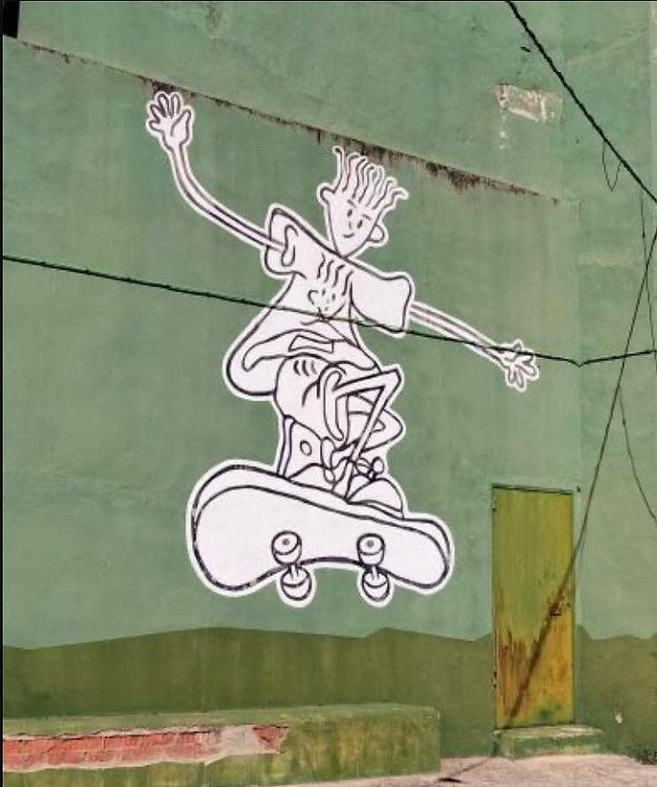 Mural de Fido Dido montando en monopatín