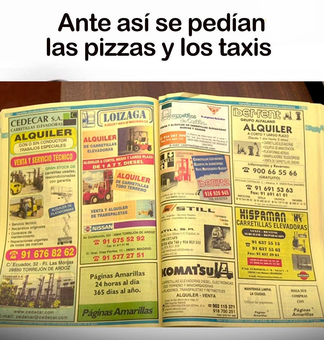 Guía de Páginas Amarillas abierta con anuncios de empresas y números de teléfono.
