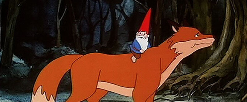 David el Gnomo montado en su zorro en el bosque